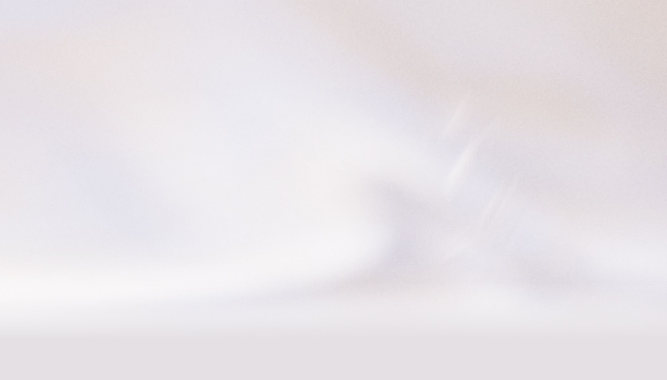 Abstract soft-focus light background image.