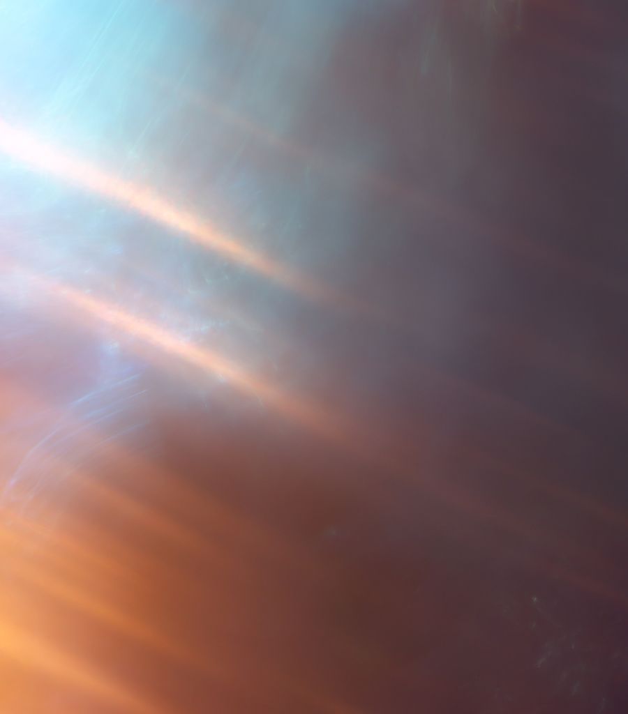 Abstract light patterns with blue and orange hues.